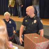 Lemoore Police Chief Michael Kendall pitches in at "Reasons for the Season"
